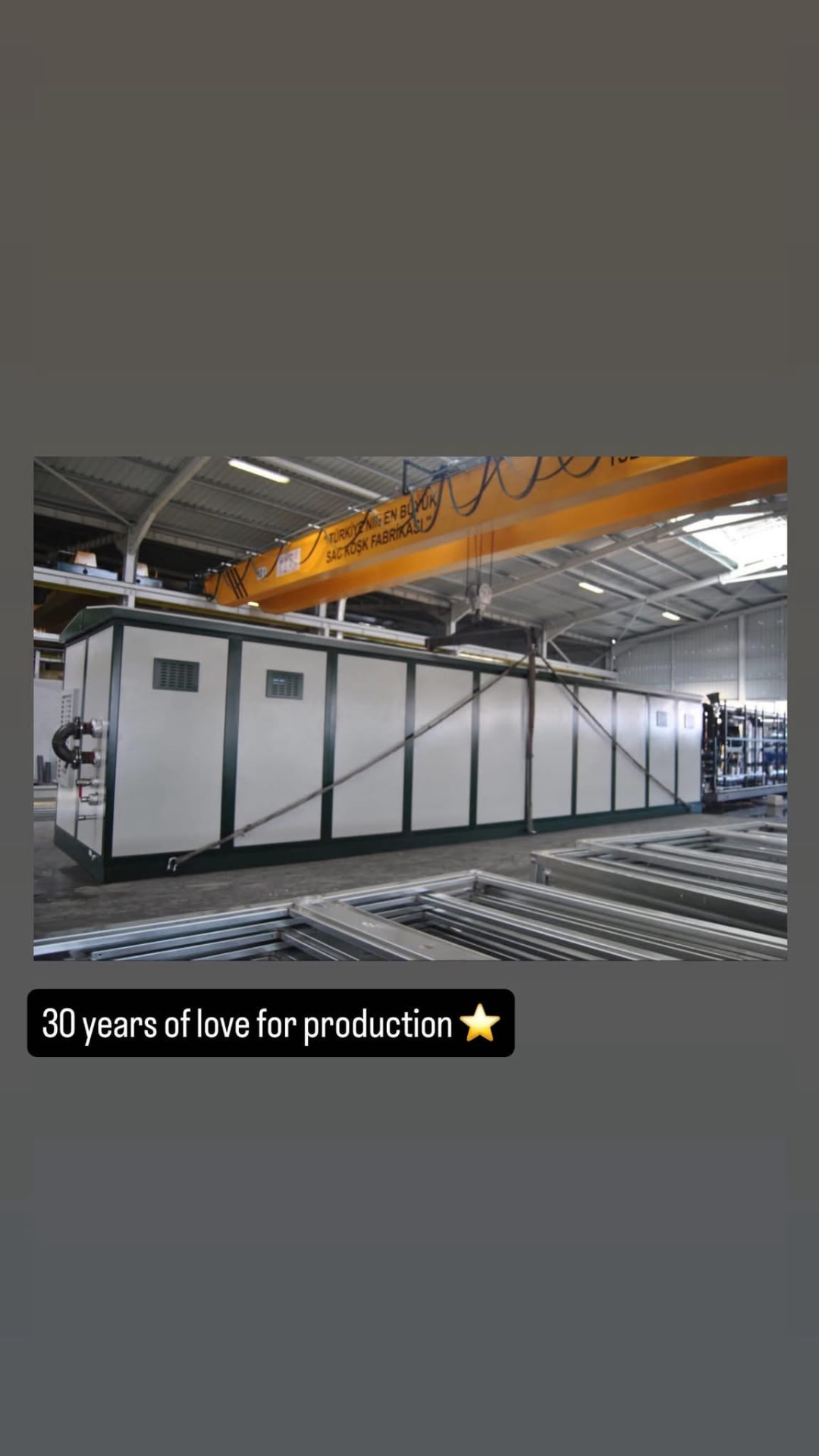 Long sheet metal container inside the factory